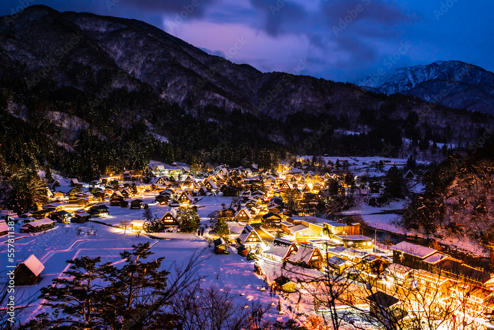 Night view of Shirakawa-go in winter (Gifu, Japan). A village registered as a World Heritage site, where the original Japanese landscape still remains.