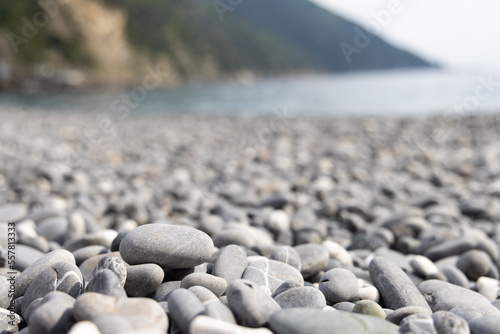 Fototapeta Naklejka Na Ścianę i Meble -  Rocky coastline. in Camogli, a fishing village and resort close to the peninsula of Portofino, in the Riviera di Levante, Genoa Liguria Italy. Tropical sea nature background.