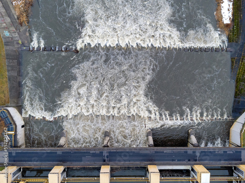 Obraz na płótnie Aerial view. Dam, rushing river, water, landscape, nature, street, bridge, winter. w salonie