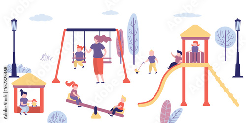 Group of different children play in playground. Teacher or nanny looks after walking children. Swings, sandbox, slide on playground in park. Kids activities. Kindergarten, childhood.