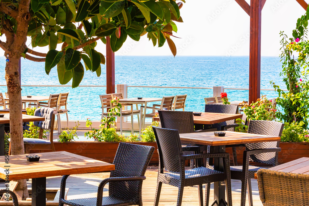 Side city (Antalya region), Turkey. Aug. 15 - 2022. Beautiful cafe on the beach at sunny morning