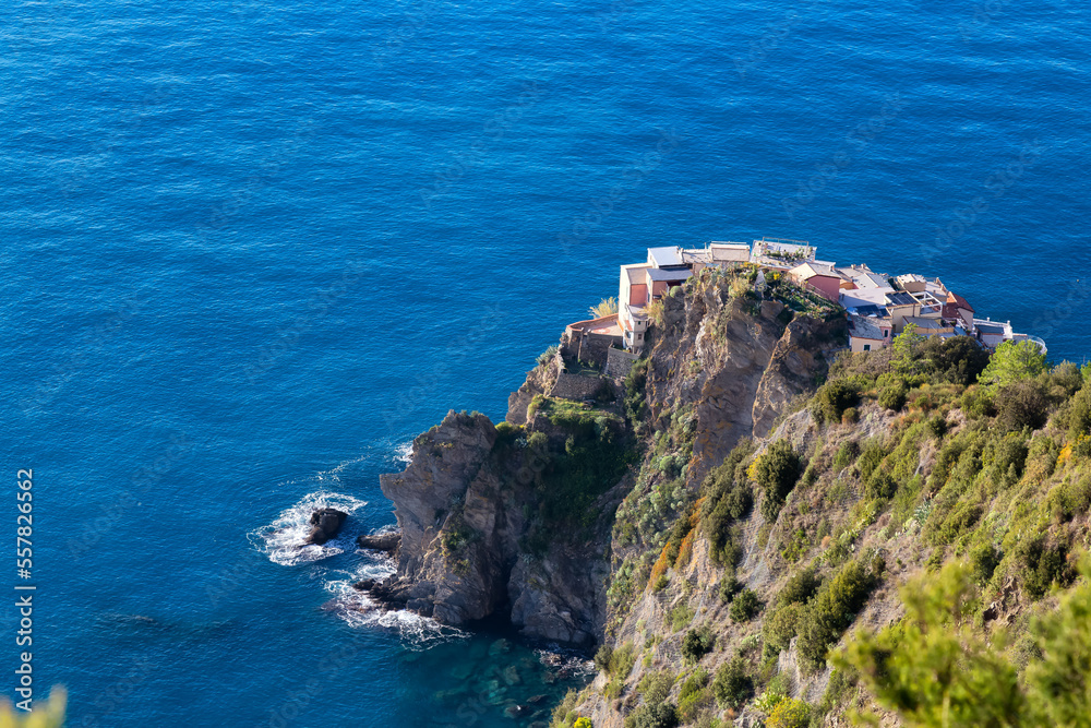 Small touristic town on the rocky coast, Manarola, Italy. Cinque Terre. Sunny Fall Season day.