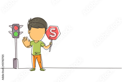 Single continuous line drawing little boy holding stop sign in arm standing near road, pedestrian rules for kids, traffic light in vector style. Child holding stop sign. Dynamic one line draw graphic
