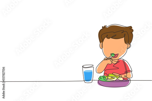 Single one line drawing boy eating healthy morning breakfast food. Happy child eat delicious food with milk at home. School boy enjoying dish. Continuous line draw design graphic vector illustration