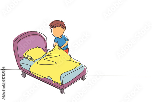 Single continuous line drawing little boy making the bed. Kids doing housework chores at home concept. Kids routine after waking up to tidy up the bed. One line draw graphic design vector illustration
