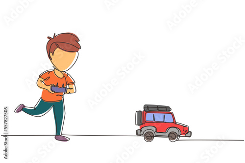 Continuous one line drawing boy playing with remote-controlled off road car. Cute kids playing with electronic toy car with remote control in hands. Single line draw design vector graphic illustration