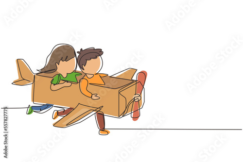 Continuous one line drawing creative kids playing as pilot with cardboard airplane. Children riding cardboard handmade airplane. Plane game pilot. Single line draw design vector graphic illustration