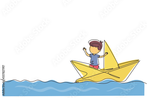 Continuous one line drawing cute smiling little boy sailing on paper boat. Happy smiling kid having fun and playing sailor in imaginary world. Single line draw design vector graphic illustration