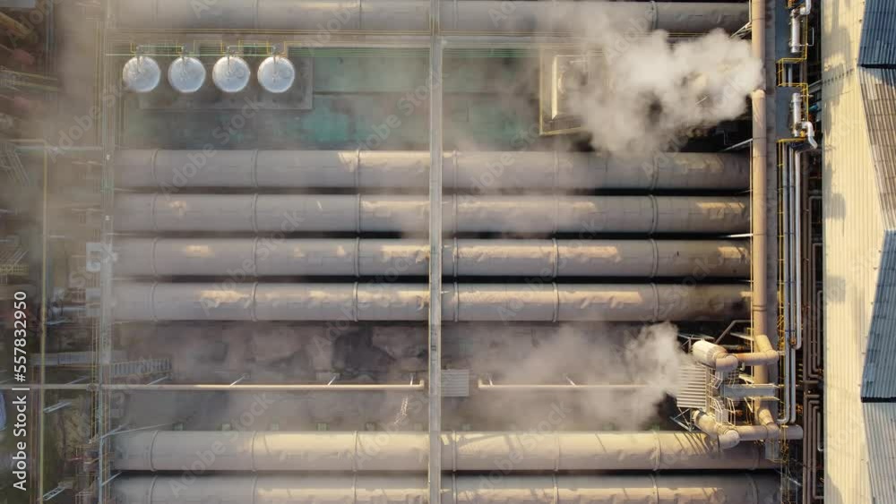 Video Stock Focus on toxic fumes spread from the roof of an industrial ...