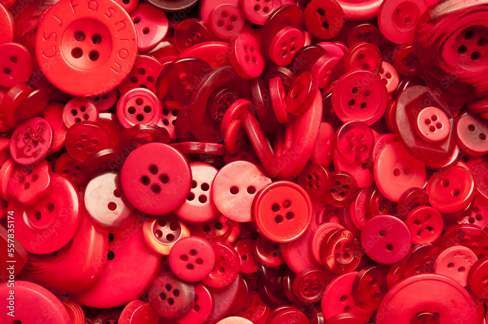 background of a variety of red buttons background of a variety of red buttons