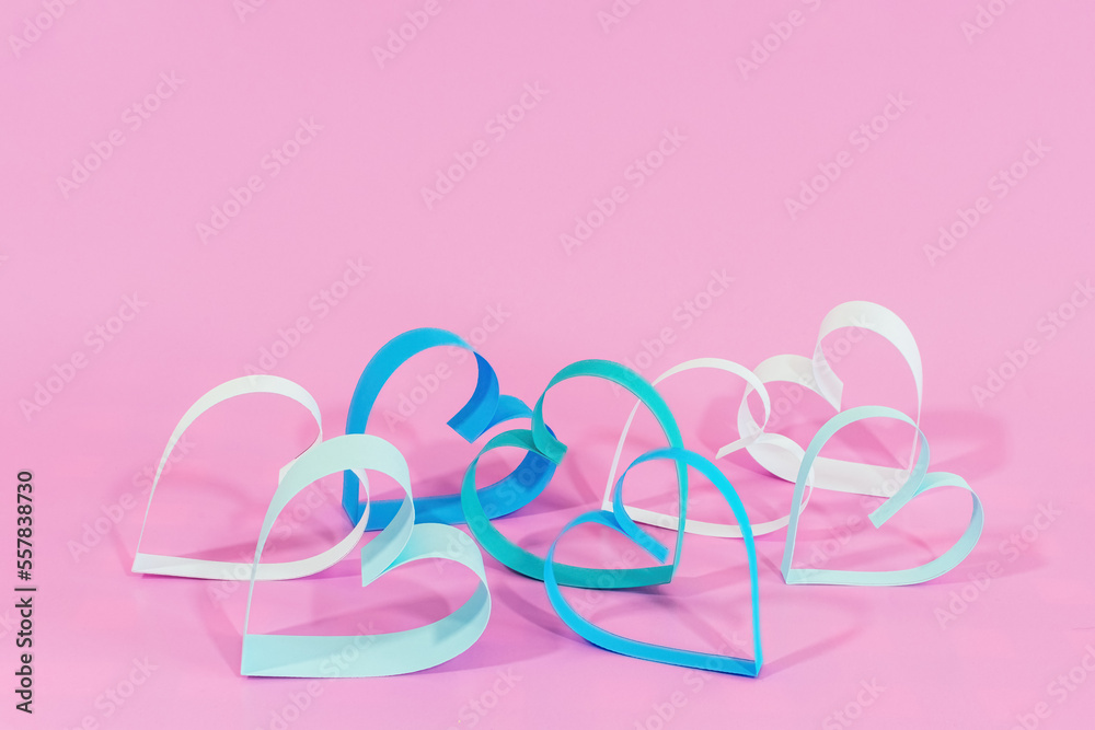 Love hearts on pink background.