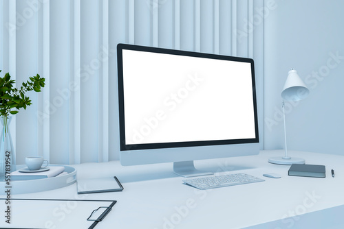 Perspective view on blank white modern computer screen with place for your logo or text on white work table with stylish lamp, notebook and green plant on slatted wall background. 3D rendering, mockup