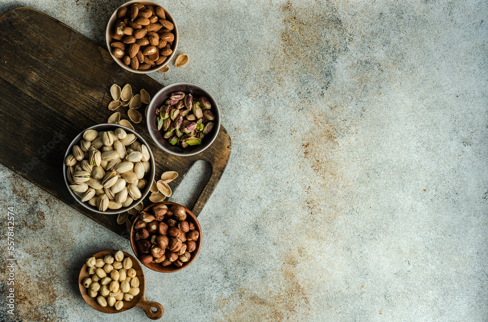 Bowls with different kinds of nuts Bowls with different kinds of nuts