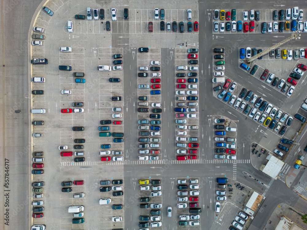 Parking. Aerial view of cars parked in line in a parking lot. Colored cars. drone view	