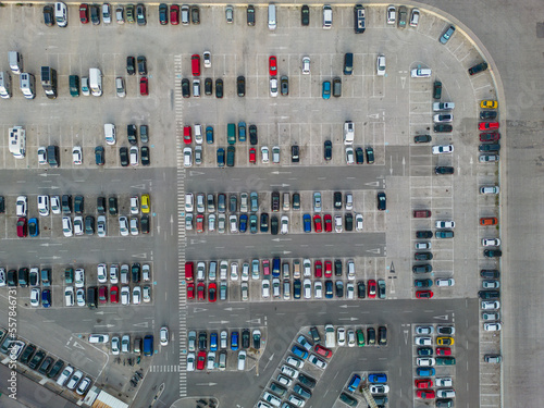Parking. Aerial view of cars parked in line in a parking lot. Colored cars. drone view 