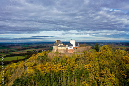 Germany, Hesse, Hering, Clouds overOtzberg Castle in autumn photo