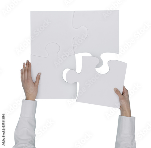 Woman assembling a jigsaw puzzle
