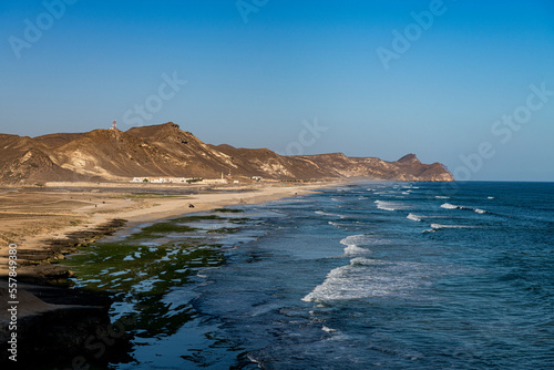 Oman, Dhofar, Salalah, View of Mughsail Beach and blue waters of Arabian Sea photo