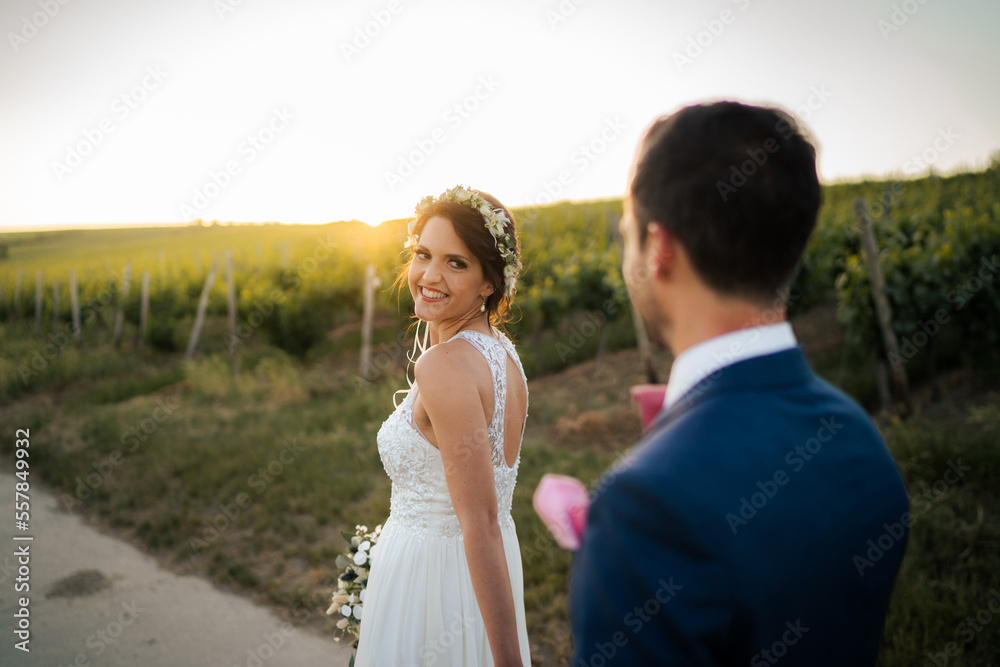 Wedding couple, bride and groom in the vineyards of Rheinhessen Wedding couple, bride and groom in the vineyards of Rheinhessen