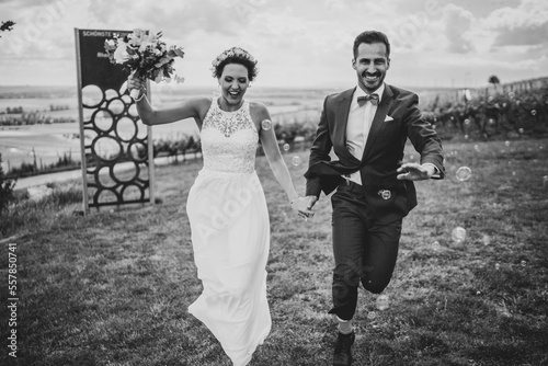 Happy couple after wedding in the vineyards of Rheinhesse, Germany photo