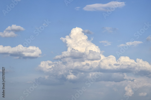 Picturesque sky with thunderstorms cumulus clouds. Overcast sky with big clouds. Air clouds background. Copy space. Soft focus.