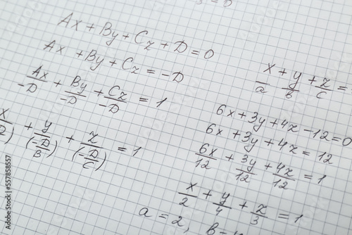 Sheet of paper with different mathematical formulas  closeup