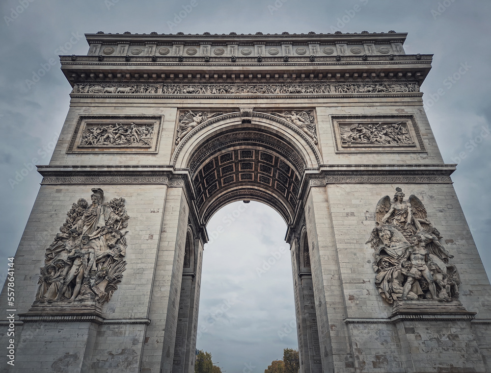 Triumphal Arch (Arc de triomphe) in Paris, France. Closeup architectural details of the famous historic landmark.
