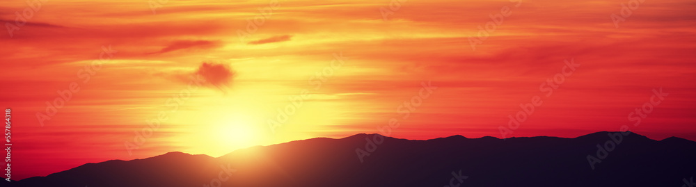 Silhouette of mountains at sunset. Rockies in the evening. Beautiful nature of Norway. Horizontal banner Silhouette of mountains at sunset. Rockies in the evening. Beautiful nature of Norway. Horizontal banner