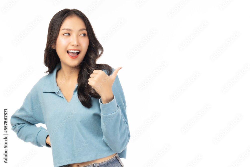 Beautiful young Asian woman pointing up to copy space and look aside to space with smile face and happy Pretty girl act like a satisfied product, use for advertising with isolated on white background Beautiful young Asian woman pointing up to copy space and look aside to space with smile face and happy Pretty girl act like a satisfied product, use for advertising with isolated on white background