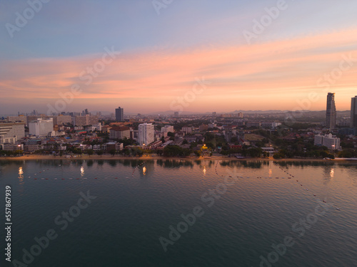 Aerial view of Pattaya sea, beach in Thailand in summer season, urban city with blue sky for travel background. Chon buri skyline.