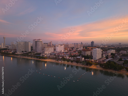 Aerial view of Pattaya sea, beach in Thailand in summer season, urban city with blue sky for travel background. Chon buri skyline.