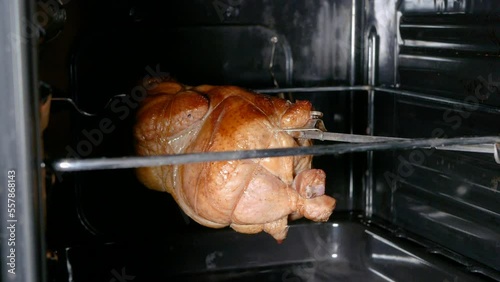 Grilled chicken, roasting chicken in the oven, close-up photo