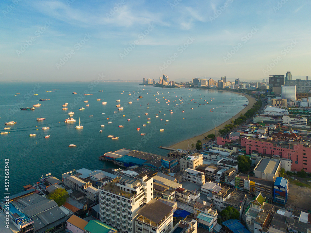 Aerial view of Pattaya sea, beach in Thailand in summer season, urban city with blue sky for travel background. Chon buri skyline.