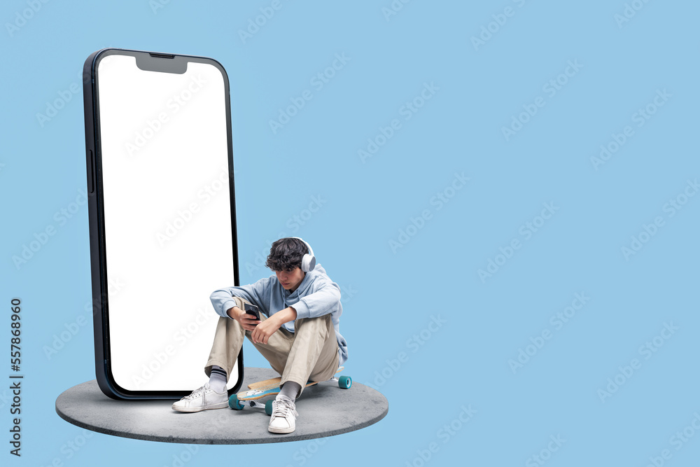 Teenage skater and big smartphone Teenage skater and big smartphone