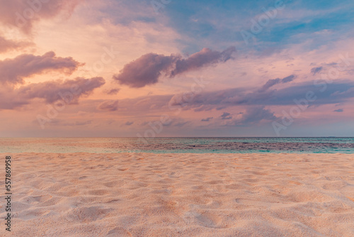Beautiful sunrise beach. Exotic happy shore waves on bright sand sea horizon. Closeup idyllic Mediterranean dream sunset sky. Peaceful tranquil relax summer colorful clouds. Positive energy meditation