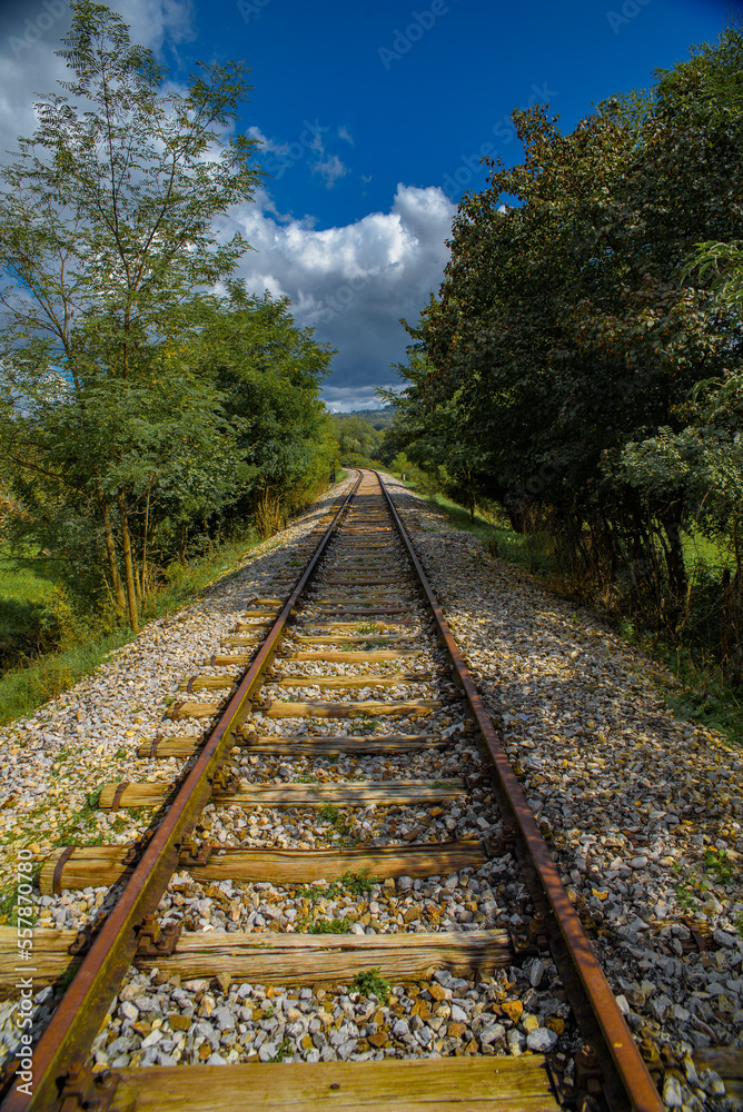 Railway track bathed in sunlight.