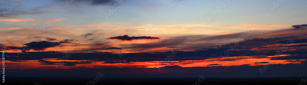 Colorful late sunset with red lava sky, panoramic view