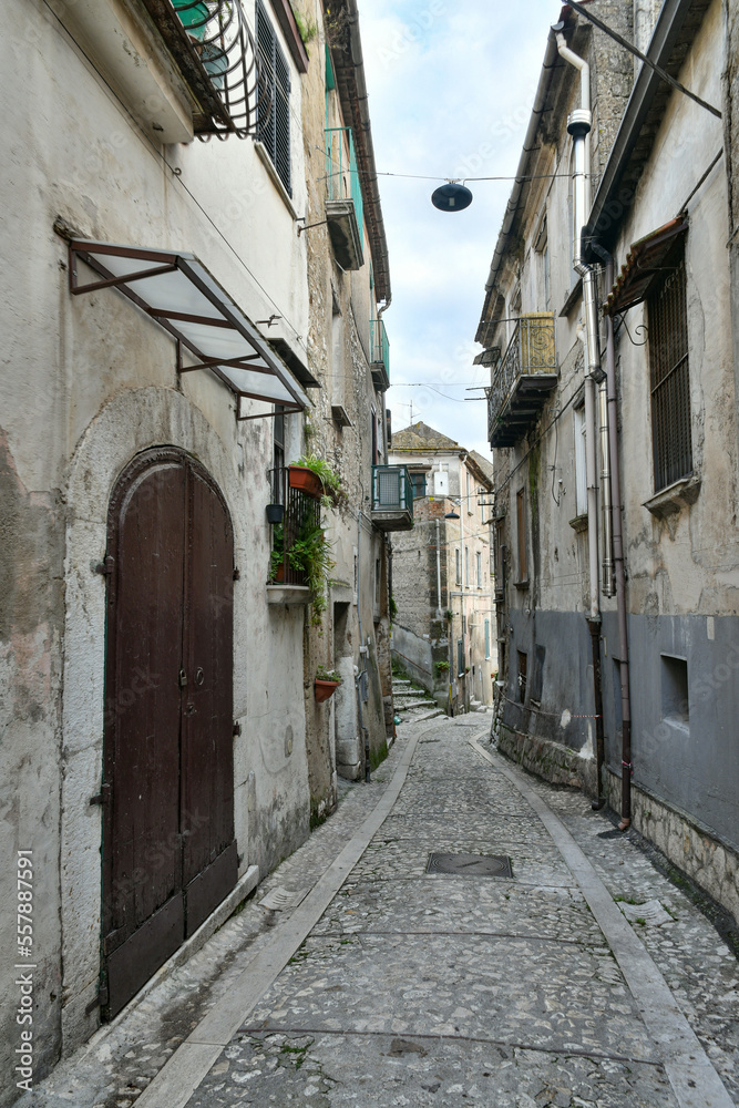A narrow street among the old houses of Montesarchio, a village in the province of Benevento in Italy.