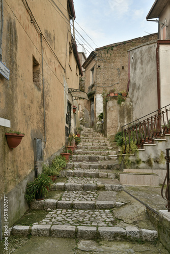 Fototapeta Naklejka Na Ścianę i Meble -  A narrow street among the old houses of Montesarchio, a village in the province of Benevento in Italy.