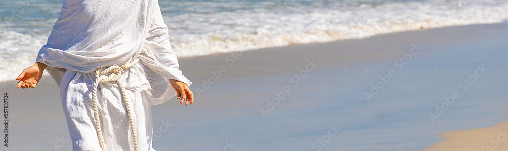 Landscape image with copy space of Christ with open arms blessing