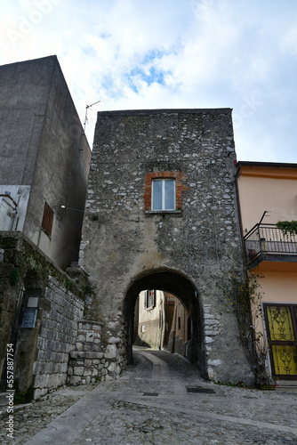 Fototapeta Naklejka Na Ścianę i Meble -  A narrow street among the old houses of Montesarchio, a village in the province of Benevento in Italy.