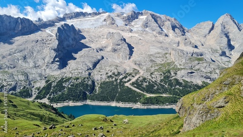 marmolada mountain with glacier and mountain lake photo
