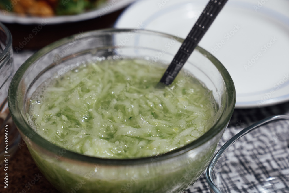 Cold summer food made with shredded cucumber and salt and vinegar Cold summer food made with shredded cucumber and salt and vinegar