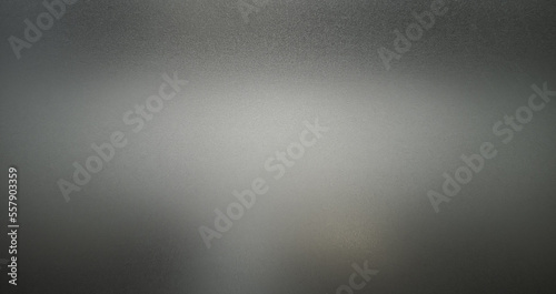 Frosted gray glass texture. Dark shadow from behind.