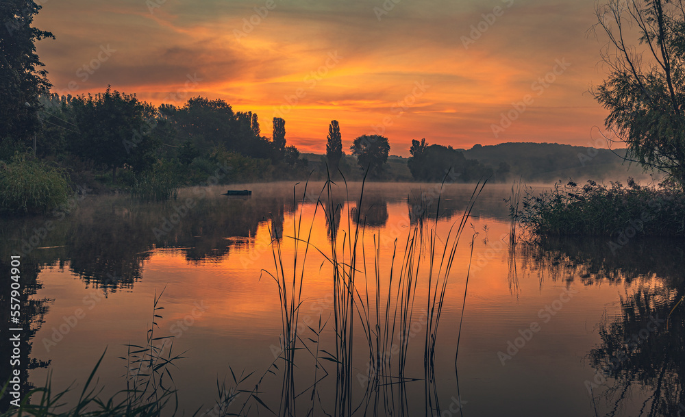 Naklejka premium Sunrise on river