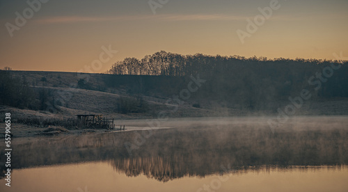 Fototapeta Naklejka Na Ścianę i Meble -  Winter sunrise on river