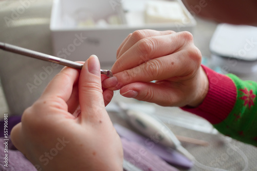young girl doing a manicure