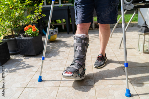 Broken Leg with a Orthese and Crutsches