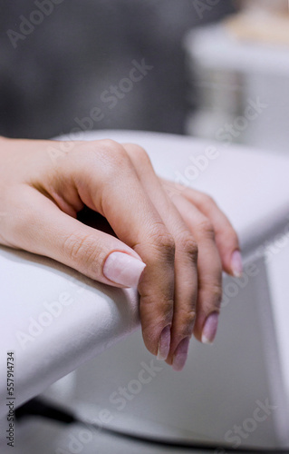 Woman hand care. Hands and spa relaxing. Beauty woman nails and clean manicure in modern salon