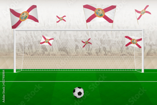 Florida football team fans with flags of Florida cheering on stadium, penalty kick concept in a soccer match.